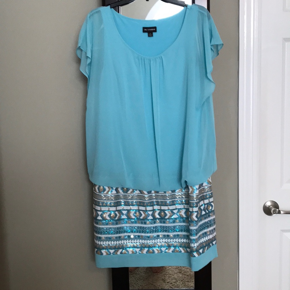 Flirty, teal dress